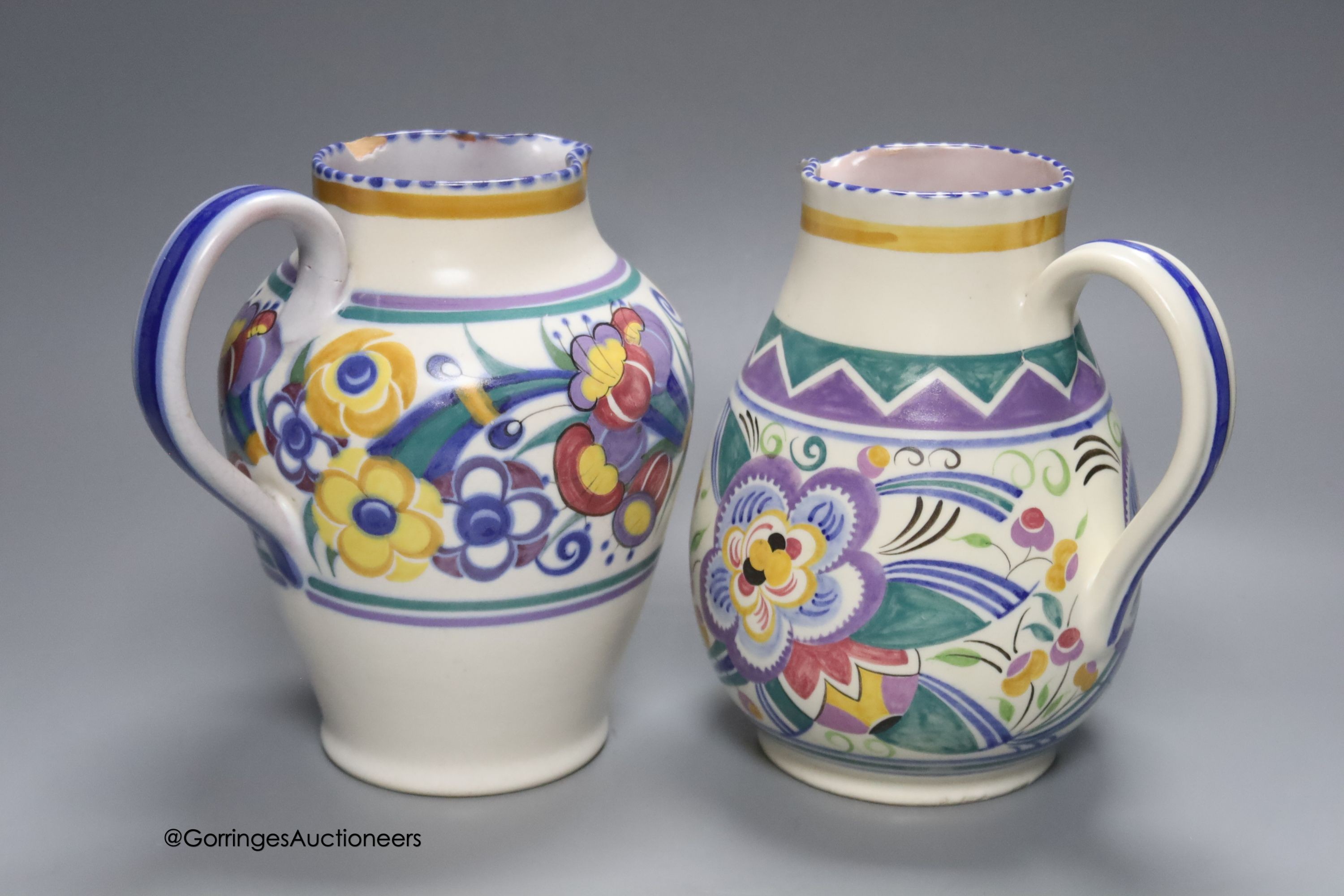 Two Poole pottery jugs, tallest 20.5cm